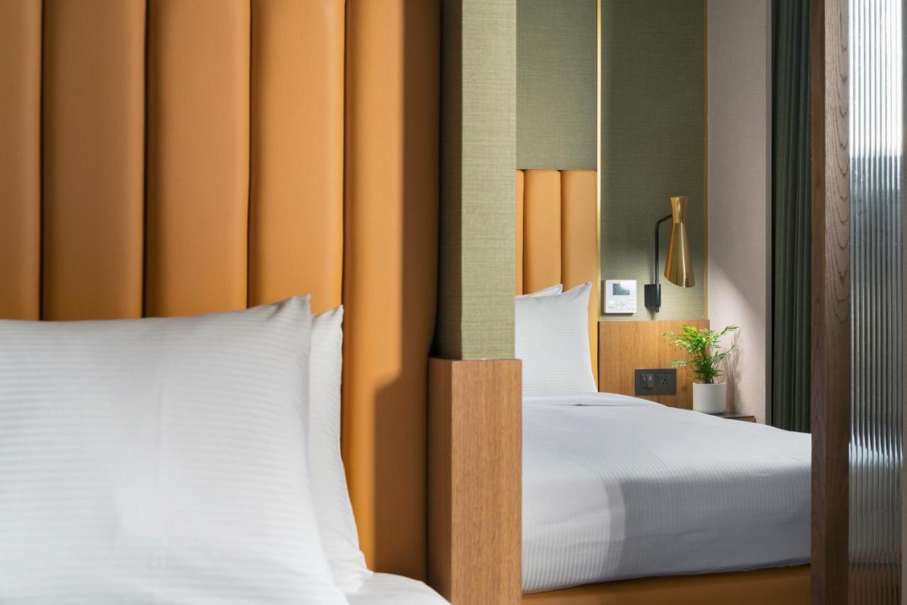 คายด์เนส เดย์ โฮเต็ล Hotel ไถหนาน ห้อง รูปภาพ